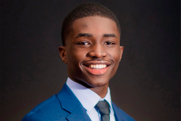 portrait of Cheick Camara ’22 in business suit