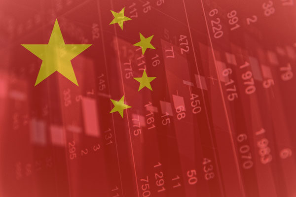 Chinese flag with stock ticker in the background.
