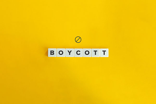 the word "boycott" in all caps on a yellow background.