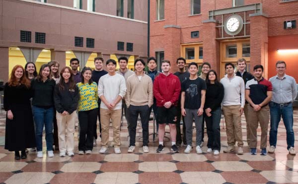 Group of 20 students in Sage Atrium selected for 2024 Kessler Fellows