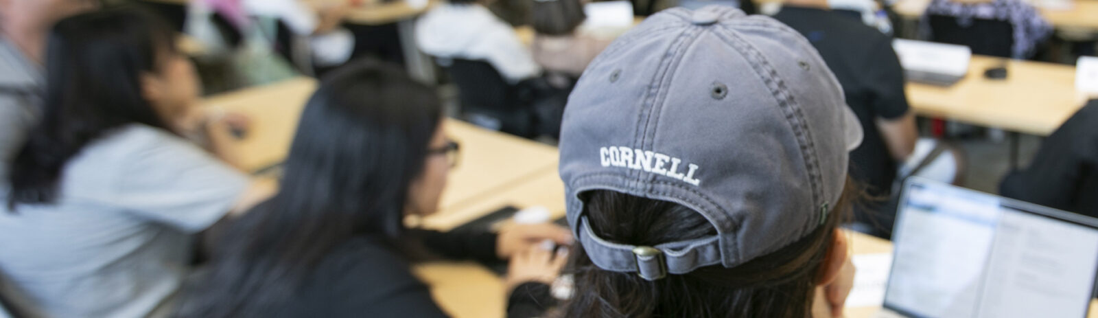 “Cornell” embroidered on the back of a baseball hat.