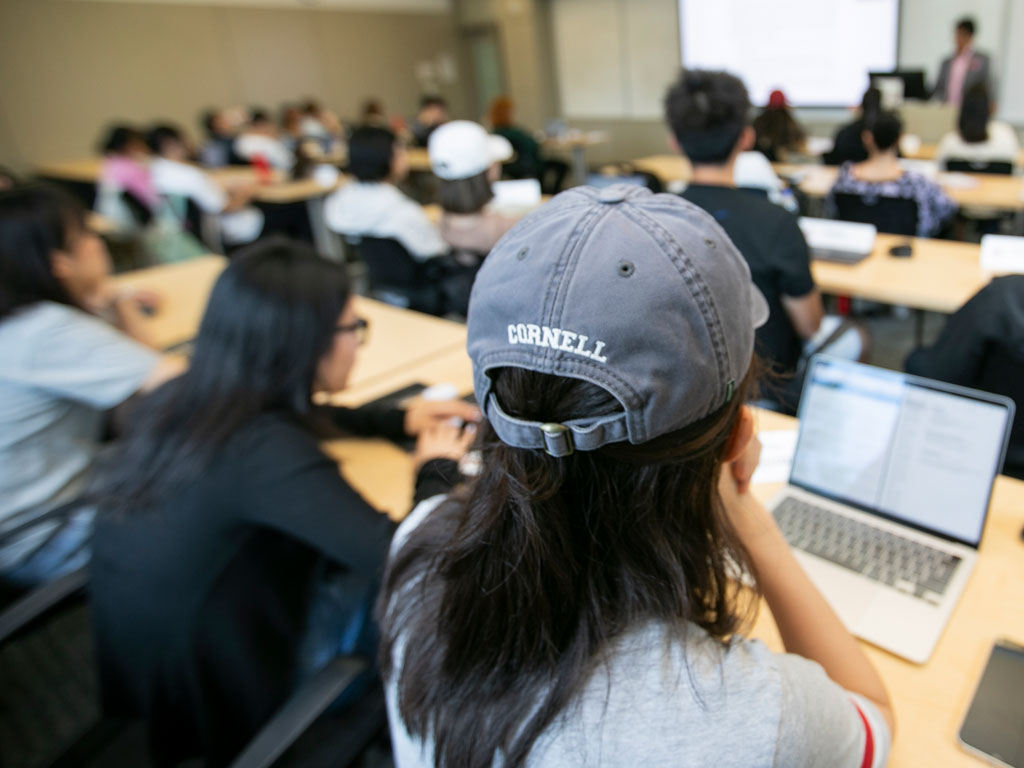 “Cornell” embroidered on the back of a baseball hat.