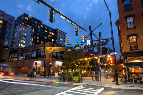 Entrance to Ithaca Commons, a pedestrian-only street, at night.