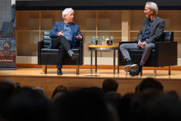 Nobel Prize-winning economist and former Cornell professor Richard Thaler, left, speaks on stage with Thomas Gilovich, the Irene Becker Rosenfeld Professor of Psychology, in the Statler Auditorium.