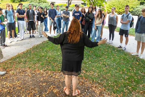 Dyson's AEM 2818 class, led by Sarah Jefferis, meet on the Ag Quad to discuss sustainability through writing.